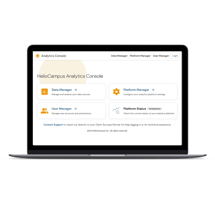 ID: A laptop displaying the dashboard for the HelioCampus Analytics Console. It includes links to the Data Manager, Platform Manager, User Manager, Platform Status, and other features.